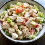 Classic chicken salad served in a bowl with fresh ingredients