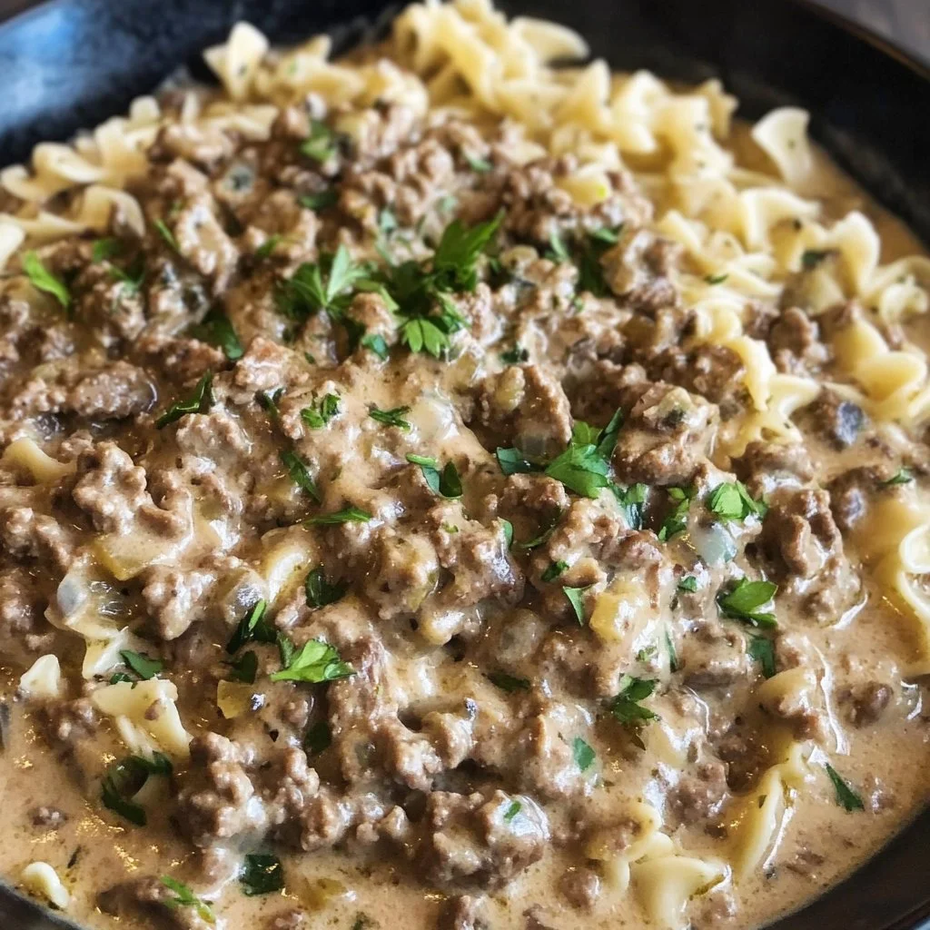 Delicious Ground Beef Stroganoff served on a plate with creamy sauce and noodles.