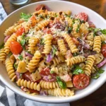 Colorful Italian Pasta Salad with vegetables and dressing